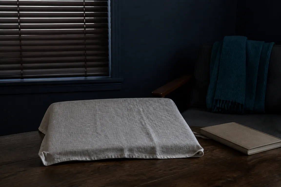 Covered laptop and drawn blinds for privacy-first click analytics
